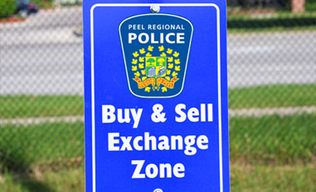 Buy and Sell Exchange Zone sign